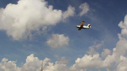 Old russian biplane on blue sky