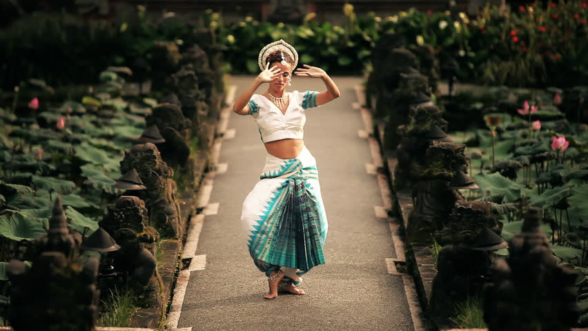 Serie with dancing girl in front of a exotic backgrounds. 