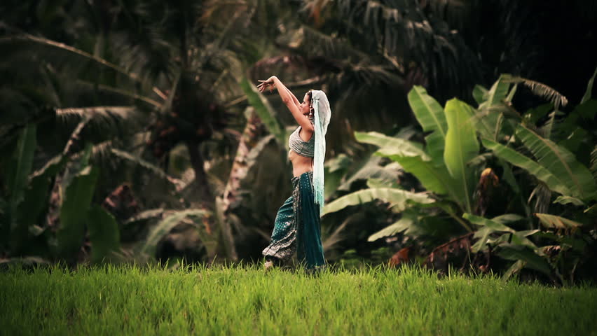 Serie with dancing girl in front of a exotic backgrounds.