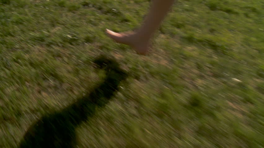 feet close up running in the park