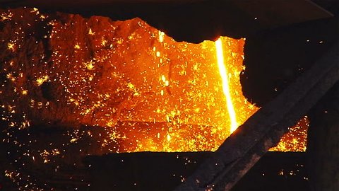 Molten metal melted in furnace at metallurgical plant