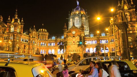 India - March 2015: Mumbai Asia time lapse Chhatrapati Shivaji Terminus CST illuminated night rail tours Unesco traffic travel