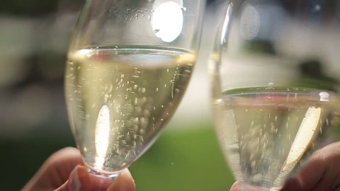Two Glasses with Champagne in Hands