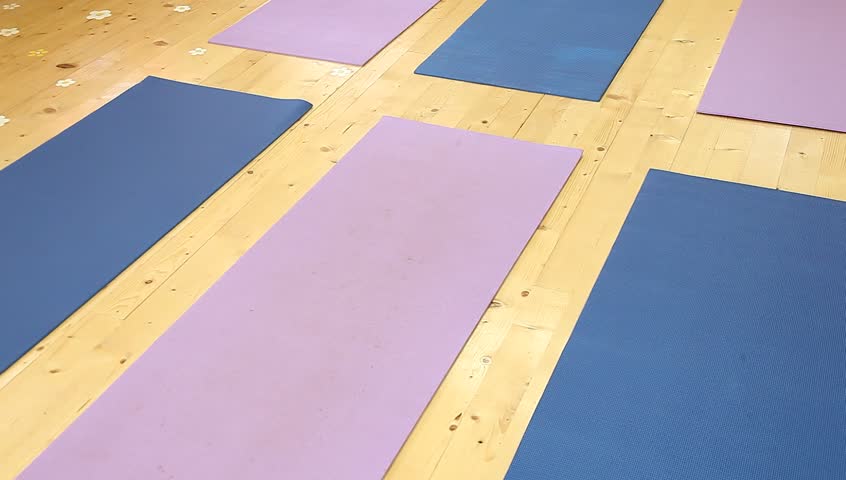 Workout mats in gym for gymnastics or yoga exercise