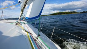 Yacht sailing on lake. Full HD RAW video