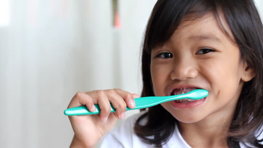 Young Kid Brushing Her Teeth Stock Footage Video 100 Royalty Free 1194049 Shutterstock