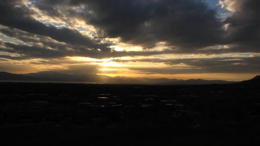 City sunset time lapse as the city falls into night