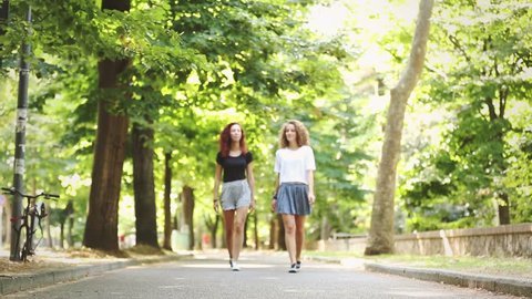 Two Beautiful Girls Walking Holding Hands Stock Footage Video (100% ...