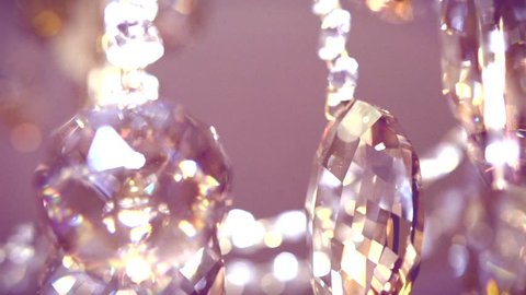 Luxury crystal chandelier close up. Out of focus. Slow motion 240 fps. High speed camera shot. Full HD 1080p. Slowmo