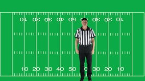 Man dressed as a football official signaling Clipping.