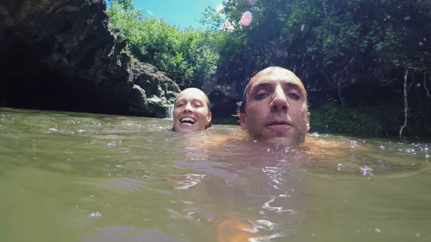 POV Point of View Selfie Cute Young Travel Couple Kissing in Waterfall Pond