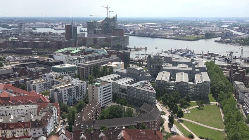 4K Aerial view of Hamburg port land with classical architecture, ancient bay building by day