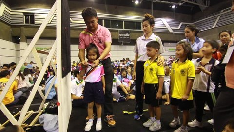BANGKOK, THAILAND - SEP 19, 2015: student of Pieamsuwan school, Kindergarten in sport competition of thailand. Children are happy. Kindergarten high jump competition.