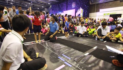 BANGKOK, THAILAND - SEP 19, 2015: student of Pieamsuwan school, Kindergarten in sport competition of thailand. Children are happy. The long jump competition for kindergarten.