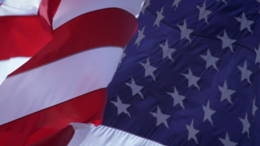 Close up view of the American flag waving in the breeze. The colors are vibrant and beautiful. | Shutterstock HD Video #11980322