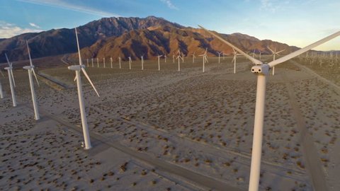 Aerial video of Windmills at sunrise in California.