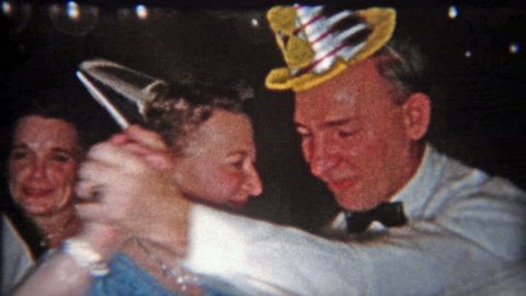 CLEVELAND, OHIO 1953: Dance party on New Years with funny hats and sweaty people.
