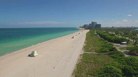 Aerial footage of the morning Haulover Beach, Miami, Florida. 4K Ultra HD, DJI Phantom 3 pro. Flying drone is approaching to the city, Horizon view.