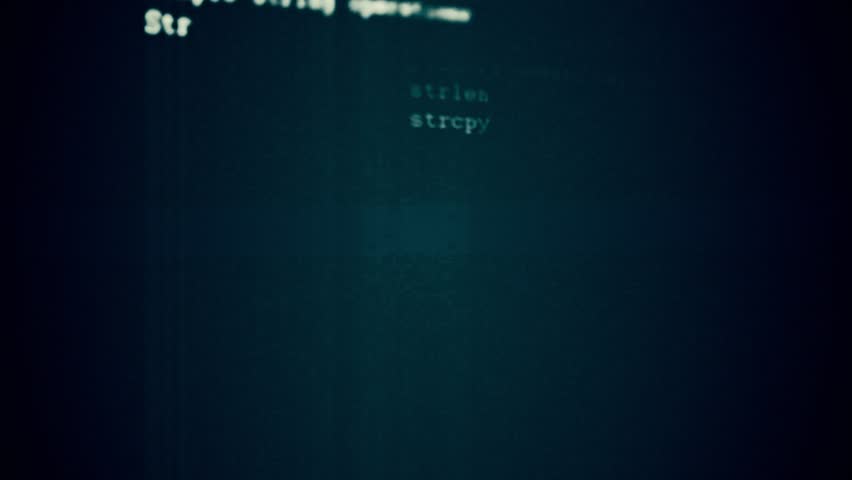 Programming code running through the computer screen terminal.  Royalty-Free Stock Footage #12020012