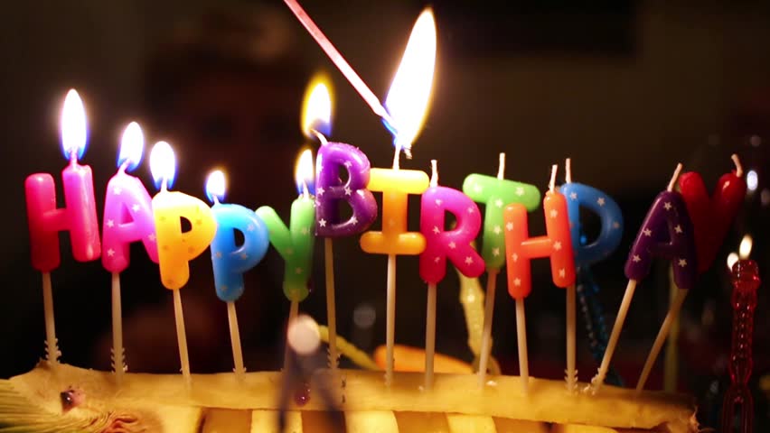 somebody lights coloured happy birthday candles Stock Footage Video ...