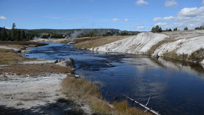 Volcanic landscape with geothermal activity in the wildlife rich land of Yellowstone National Park, USA. Yellowstone HD Video.