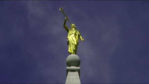 Golden Angel Moroni statue atop Mormon temple in Salt Lake City, Utah.