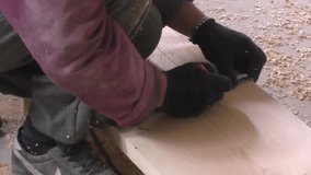 Man measures the wooden board, 
Man measures the wooden board, 
, carpentry


