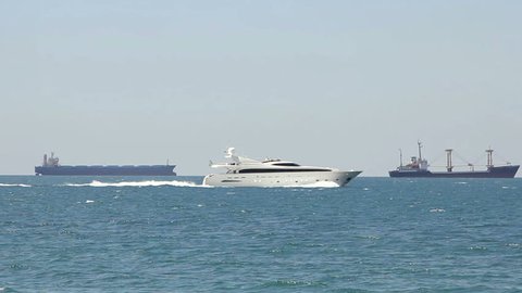 Novorossiysk, Russian Federation – June 02, 2015: Luxury white speed yatch in open waters