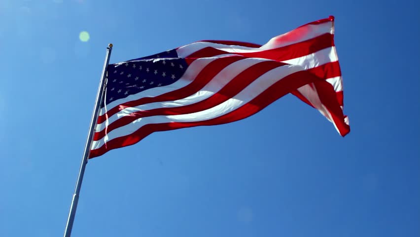 United States flag blowing in the wind