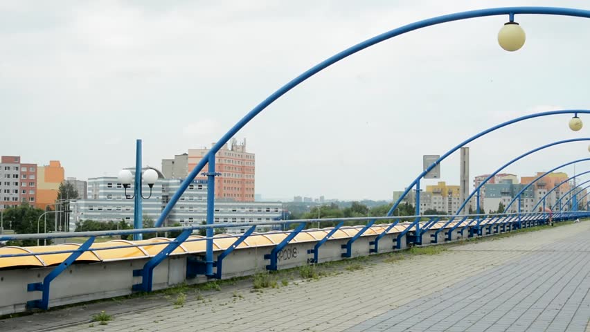 infinite long bridge above the city - outlook of buildings and surroundings