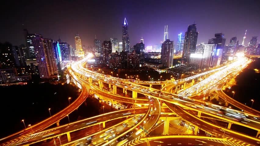 Time lapse,Aerial View of freeway busy city rush hour heavy traffic jam highway,shanghai Yan'an East Road Overpass interchange,driving racing by with streaking lights trail. gh2_07475 | Shutterstock HD Video #12098378