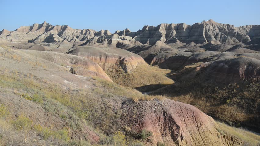 HD video: Badlands landscape, formed by deposition and erosion by wind and water, contains some of the richest fossil beds in the world, Badlands National Park, South Dakota, USA