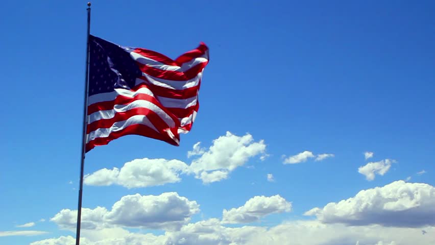 The flag of the United States of America blowing in the wind 