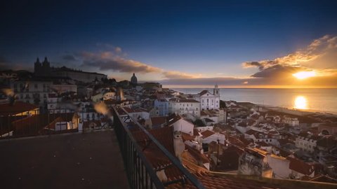 Cinemagraph Loop - Sunset over a coastine town in Lisbon, Portugal - Motion photo