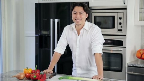 A Young Amateur Chef Standing Video De Stock Totalmente Libre De Regalias 12132623 Shutterstock