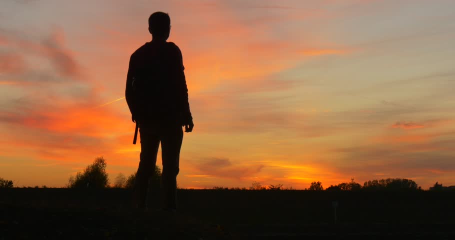 man backpack man's silhouette sunset standing Stock Footage Video (100% ...