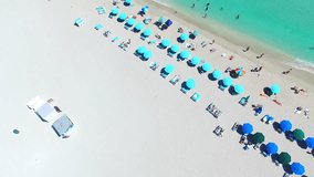 Aerial 4K video of South Beach, Miami Beach. Amazing bird's view on most famous beach in the World and Collins Park.