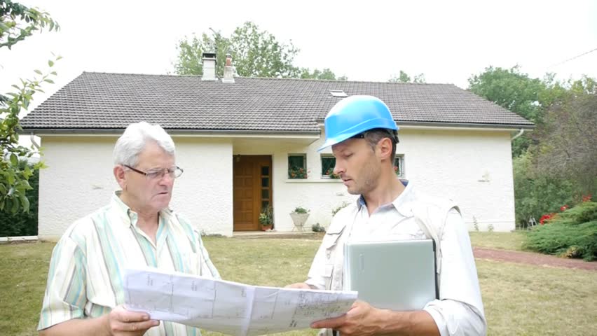 Architect meeting private individual at home