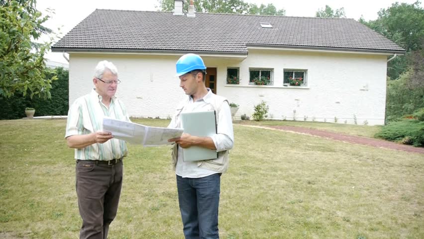 Architect meeting private individual at home