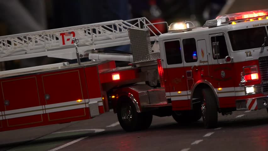 Fire trucks parked in a street background - unfocused style of the camera