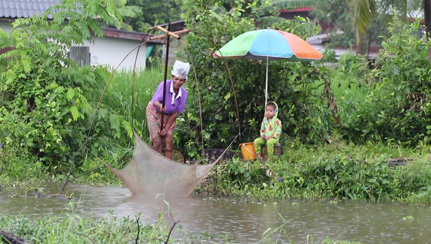 Fishing in the Rain, a Stock Footage Video (100% Royalty-free) 12165536 |  Shutterstock