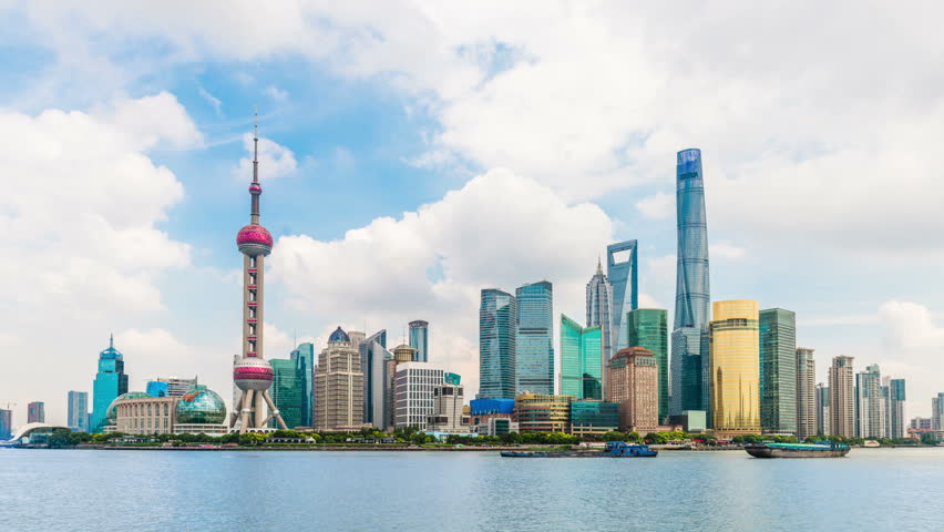 Time-lapse photography 4k-Skyline view from Bund waterfront on Pudong New Area- the business quarter of the Shanghai. Shanghai in most dynamic city of China.