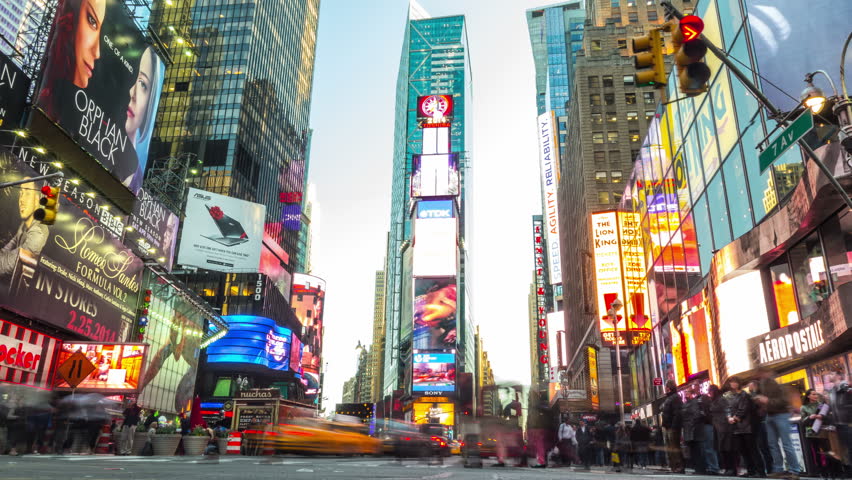 NEW YORK CITY - April 14, 2014: Time lapse of Times Square. Zoom in.
Crowded street and traffic at the most famous commercial intersection and neighborhood in Midtown Manhattan. United States. Royalty-Free Stock Footage #12213254
