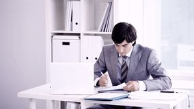 A young business man working in office. You can add your texts