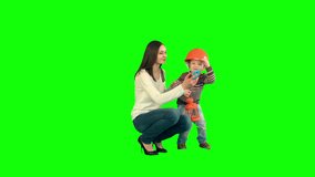 Boy taking a selfie with her mother on a Green Screen, Chroma Key. Professional shot on BMCC RAW with high dynamic range. You can use it e.g in your commercial video, family video, music video.