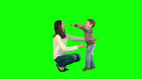Lovely portrait of a mother and son on a Green Screen, Chroma Key. Professional shot on BMCC RAW with high dynamic range. You can use it e.g in your commercial video, family video, music video.