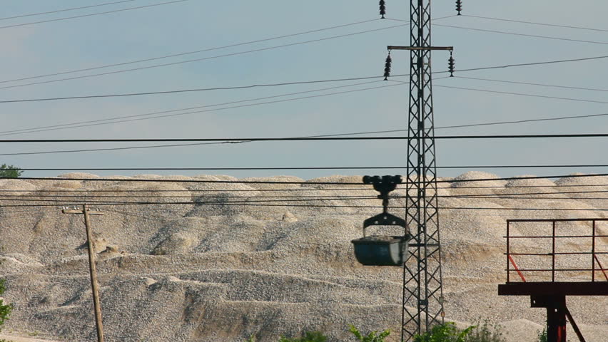 industrial cableway and moving trolleys with rock