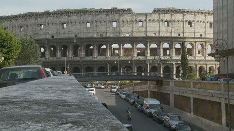 Time lapse 1 busy traffic and side Colosseum. Rome, Italy. 2011