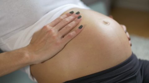 Belly rubbing. Pregnant belly RUB. Woman belly RUB.