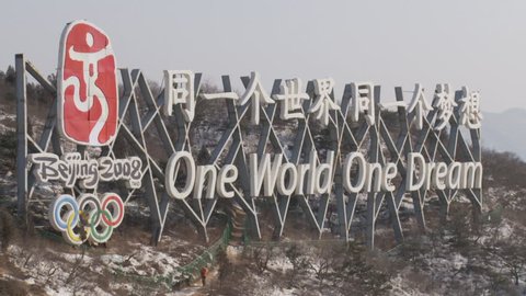 Beijing, China - January 2010: 2008 Olympics sign "One world one dream" near the Great Wall at Badaling, Beijing, China.